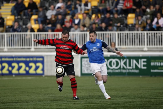 Kent FA Sunday Premier Cup Final between Simla (Blue) and Quested (Red).