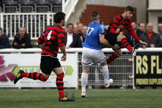 Kent FA Sunday Premier Cup Final between Simla (Blue) and Quested (Red).