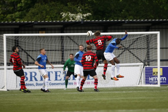 Kent FA Sunday Premier Cup Final between Simla (Blue) and Quested (Red).