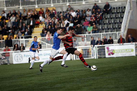 Kent FA Sunday Premier Cup Final between Simla (Blue) and Quested (Red).