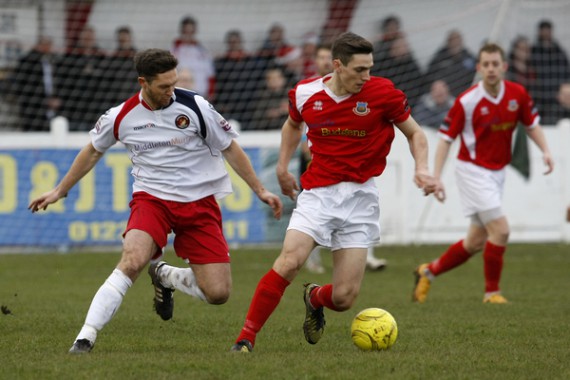 FA Trophy match Whitstable v Ebbsfleet. Whitstable in red shirts.