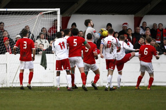 FA Trophy match Whitstable v Ebbsfleet. Whitstable in red shirts.